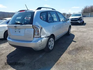 2009 Kia Rondo LX with VIN KNAFG529297274333, listed as a IAAI auction lot 41930091 with 45,960 mi miles. Bid and sale history available at carsss.com. Image 4.