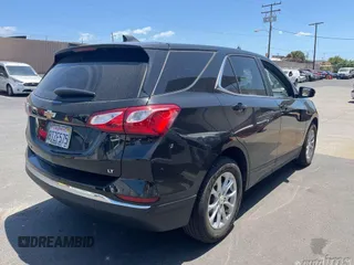 2021 Chevrolet Equinox LT z VIN 2GNAXJEVXM6123304, wystawiony jako IAAI lot #42495741 z przebiegiem 104 672 mil mil oraz . Historia ofert i sprzedaży dostępna na DreamBid. Obrazek 1.