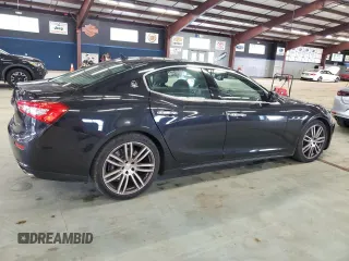 2015 Maserati Ghibli S Q4 with VIN ZAM57RTA3F1150242, listed as a Copart auction lot 61202585 with 21,271 mi miles and Salvage title. Bid and sale history available at DreamBid. Image 3.
