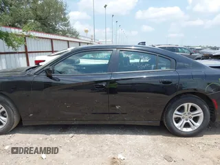 2023 Dodge Charger SXT z VIN 2C3CDXBG0PH564343, wystawiony jako IAAI lot #42351311 z przebiegiem 52 570 mil mil oraz . Historia ofert i sprzedaży dostępna na DreamBid. Obrazek 14.