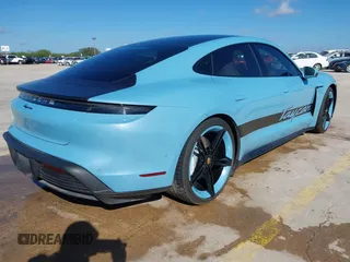 2022 Porsche Taycan with VIN WP0AA2Y10NSA10908, listed as a IAAI auction lot 42257582 with 23,806 mi miles and . Bid and sale history available at DreamBid. Image 4.