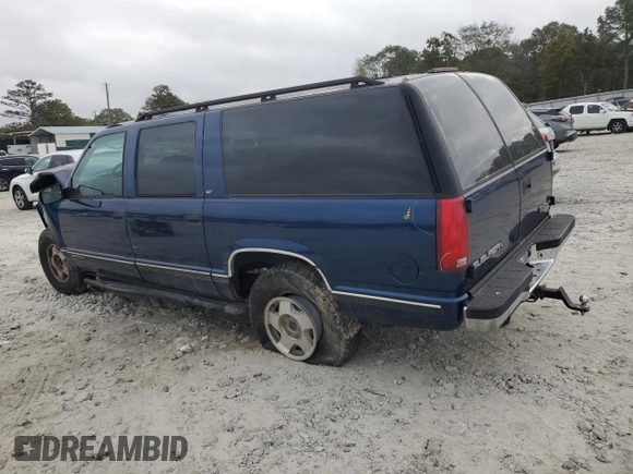 1997 GMC Suburban with VIN 3GKFK16R4VG519902, listed as a Copart auction lot 79031204 with 195,624 mi miles and Salvage Title. Bid and sale history available at DreamBid. Image 2.