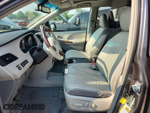 2011 Toyota Sienna XLE with VIN 5TDDK3DC6BS026264, listed as a Copart auction lot 60548865 with 147,516 mi miles and Salvage title. Bid and sale history available at DreamBid. Image 7.