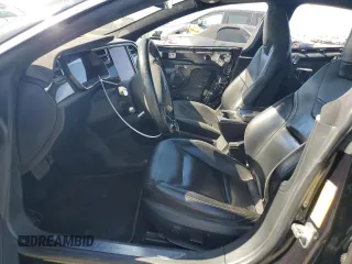 2016 Tesla Model S 90D with VIN 5YJSA1E2XGF129106, listed as a Copart auction lot 59162185 with 136,004 mi miles and Salvage title. Bid and sale history available at DreamBid. Image 7.