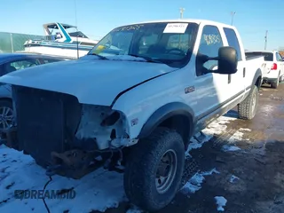 1999 Ford Super Duty F-250 XL with VIN 1FTNW21F9XEC14744, listed as a IAAI auction lot 41290325 with 200,113 mi miles. Bid and sale history available at carsss.com. Image 2.