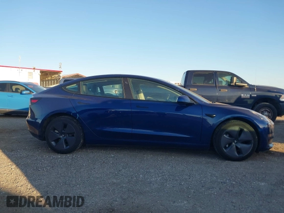 2022 Tesla Model 3 with VIN 5YJ3E1EA3NF190553, listed as a IAAI auction lot 41760731 with 90,268 mi miles. Bid and sale history available at carsss.com. Image 13.