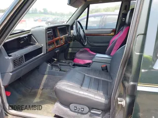 1995 Jeep Cherokee with VIN 1J4FN78S1SL640692, listed as a IAAI auction lot 42577079 with 232,087 mi miles and . Bid and sale history available at DreamBid. Image 5.
