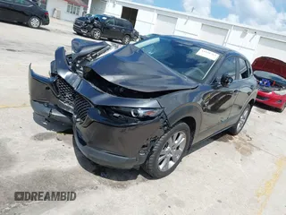 2021 Mazda CX-30 Select with VIN 3MVDMBBL2MM261169, listed as a IAAI auction lot 41938783 with 74,996 mi miles. Bid and sale history available at carsss.com. Image 2.