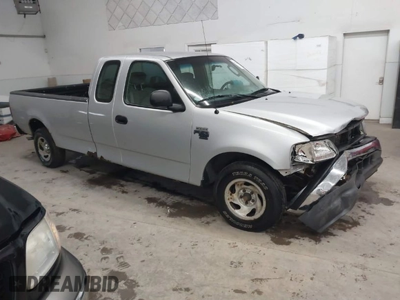 2002 Ford F-150 XL with VIN 1FTRX17W52NB23883, listed as a IAAI auction lot 41721680 with 144,115 mi miles. Bid and sale history available at carsss.com. Image 1.