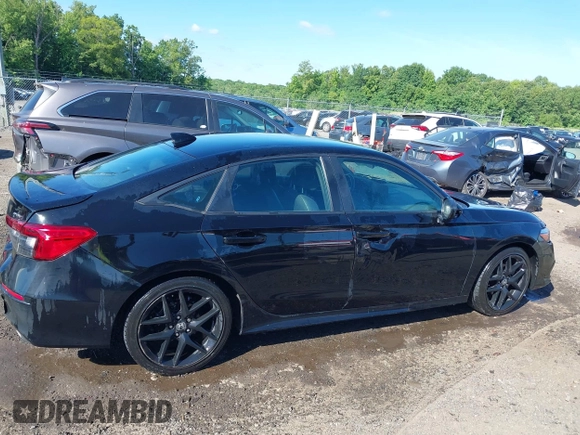 2023 Honda Civic Sport with VIN 2HGFE2F56PH509382, listed as a IAAI auction lot 42296205 with 125,584 mi miles and . Bid and sale history available at DreamBid. Image 13.