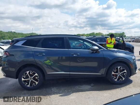 2023 Kia Sportage EX with VIN KNDPVCAG2P7046184, listed as a IAAI auction lot 42212231 with 25,212 mi miles and . Bid and sale history available at DreamBid. Image 13.