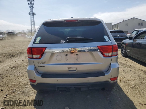 2012 Jeep Grand Cherokee Laredo with VIN 1C4RJFAG4CC123354, listed as a Copart auction lot 52711295 with 151,004 mi miles and Salvage Title. Bid and sale history available at carsss.com. Image 6.