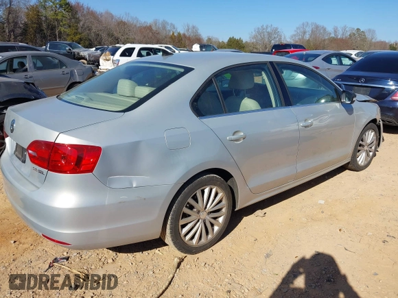 2011 Volkswagen Jetta SEL with VIN 3VWLX7AJ6BM330148, listed as a IAAI auction lot 41663551 with 128,673 mi miles and . Bid and sale history available at DreamBid. Image 4.