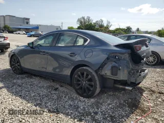 2022 Mazda 3 Carbon Edition с VIN 3MZBPACL3NM318079, выставлен на аукционе Copart как лот 58185015 с пробегом 36 299 миль миль и Списание • Salvage title. История ставок и продаж доступна на DreamBid. Изображение 2.