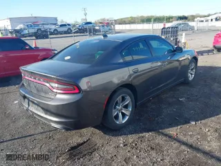 2016 Dodge Charger SXT with VIN 2C3CDXHG3GH357176, listed as a IAAI auction lot 41973540 with 69,240 mi miles. Bid and sale history available at carsss.com. Image 4.