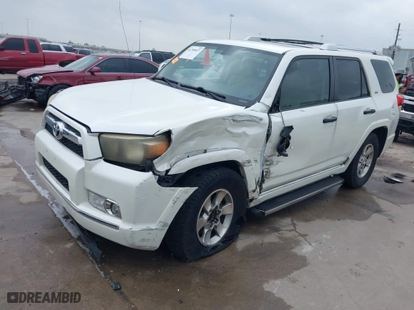 2011 Toyota 4Runner SR5 with VIN JTEZU5JR7B5014100, listed as a IAAI auction lot 41769637 with 215,474 mi miles. Bid and sale history available at carsss.com. Image 2.