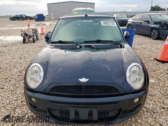 2005 MINI Convertible with VIN WMWRF33485TF61638, listed as a Copart auction lot 59822125 with 89,011 mi miles and Clean title. Bid and sale history available at DreamBid. Image 5.