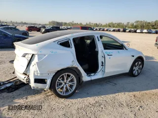 2023 Tesla Model Y Long Range z VIN 7SAYGDEE8PA069248, wystawiony jako Copart lot #74120944 z przebiegiem 17 085 mil mil oraz Szkoda całkowita • Salvage title. Historia ofert i sprzedaży dostępna na DreamBid. Obrazek 3.