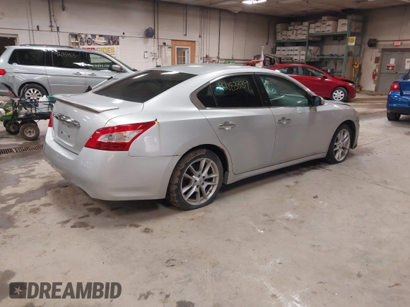 2011 Nissan Maxima SV with VIN 1N4AA5AP4BC802777, listed as a IAAI auction lot 42183339 with 164,807 mi miles and . Bid and sale history available at DreamBid. Image 4.