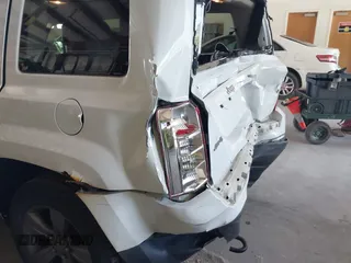 2014 Jeep Patriot Latitude with VIN 1C4NJRFB1ED687912, listed as a IAAI auction lot 42577920 with 150,327 mi miles and . Bid and sale history available at DreamBid. Image 6.