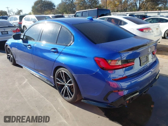 2020 BMW 3 Series M340i xDrive with VIN WBA5U9C06LFH24903, listed as a IAAI auction lot 41041530 with 55,949 mi miles and . Bid and sale history available at DreamBid. Image 3.