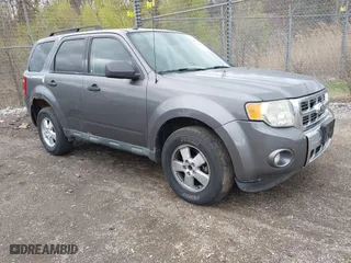 2010 Ford Escape XLT with VIN 1FMCU9DG0AKA94301, listed as a IAAI auction lot 42079032 with 201,212 mi miles. Bid and sale history available at carsss.com. Image 1.