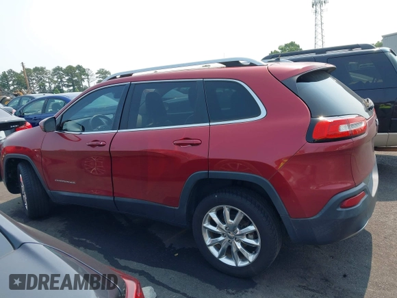 2014 Jeep Cherokee Limited z VIN 1C4PJLDB9EW314128, wystawiony jako IAAI lot #42407723 z przebiegiem 158 982 mil mil oraz . Historia ofert i sprzedaży dostępna na DreamBid. Obrazek 14.
