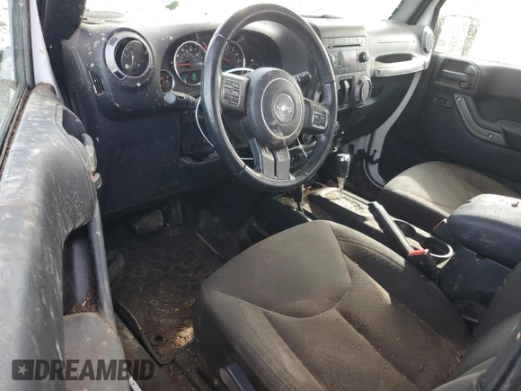2016 Jeep Wrangler Willys Wheeler z VIN 1C4AJWAG4GL243285, wystawiony jako Copart lot #58035425 z przebiegiem 100 251 mil mil oraz Szkoda całkowita • Salvage title. Historia ofert i sprzedaży dostępna na DreamBid. Obrazek 8.