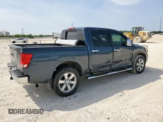 2013 Nissan Titan Pro-4X with VIN 1N6BA0EC3DN310741, listed as a Copart auction lot 57171975 with 146,524 mi miles and Salvage title. Bid and sale history available at DreamBid. Image 3.