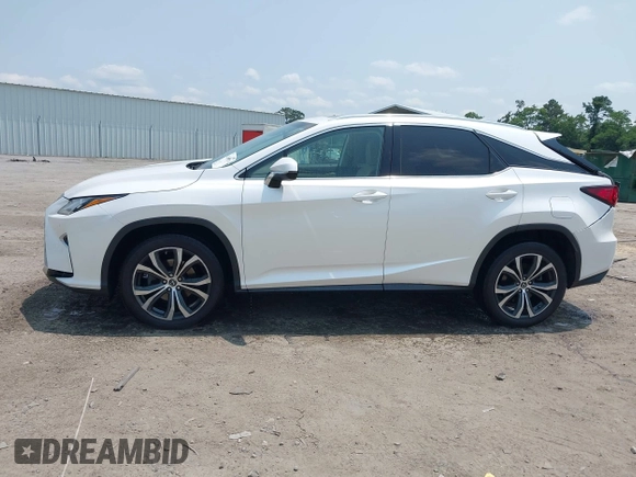 2019 Lexus RX 350 with VIN 2T2BZMCA7KC182763, listed as a IAAI auction lot 42418779 with 82,254 mi miles and . Bid and sale history available at DreamBid. Image 14.