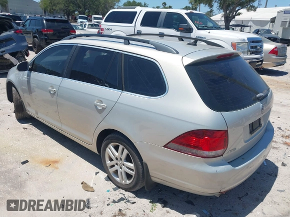 2010 Volkswagen Jetta SportWagen TDI with VIN 3VWPL7AJ5AM687879, listed as a IAAI auction lot 42051137 with 176,398 mi miles. Bid and sale history available at carsss.com. Image 3.