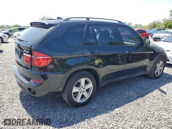 2011 BMW X5 35d with VIN 5UXZW0C58BL662048, listed as a Copart auction lot 55648975 with 166,291 mi miles and Salvage title. Bid and sale history available at DreamBid. Image 3.