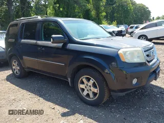 2010 Honda Pilot Touring z VIN 5FNYF4H9XAB021341, wystawiony jako IAAI lot #42797943 z przebiegiem 240 700 mil mil oraz . Historia ofert i sprzedaży dostępna na DreamBid. Obrazek 1.
