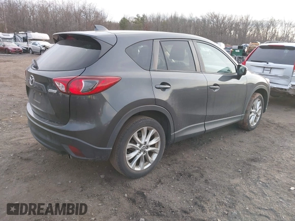 2015 Mazda CX-5 Grand Touring with VIN JM3KE4DY5F0470445, listed as a IAAI auction lot 41236468 with 87,845 mi miles. Bid and sale history available at carsss.com. Image 4.