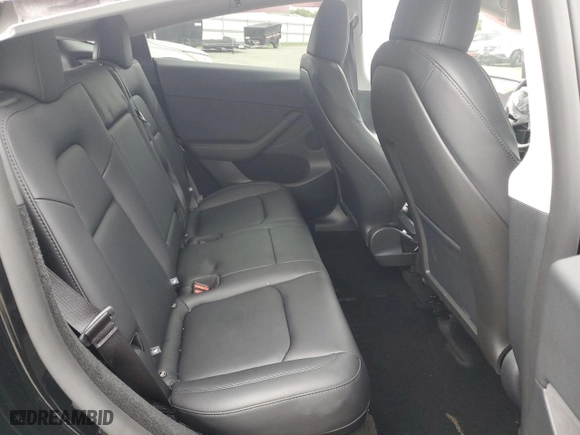 2025 Tesla Model Y Long Range with VIN 7SAYGDEE6SF308226, listed as a Copart auction lot 48006865 with 2,291 mi miles and Salvage Title. Bid and sale history available at carsss.com. Image 12.