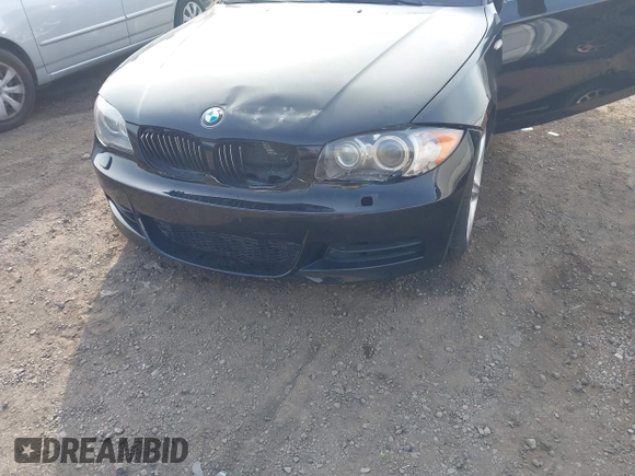 2010 BMW 1 Series 135i with VIN WBAUN9C54AVK41785, listed as a IAAI auction lot 41228825 with 60,817 mi miles and . Bid and sale history available at carsss.com. Image 6.