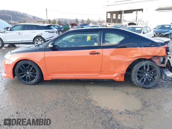 2015 Scion tC with VIN JTKJF5C77FJ008276, listed as a IAAI auction lot 41679236 with 90,987 mi miles. Bid and sale history available at carsss.com. Image 14.