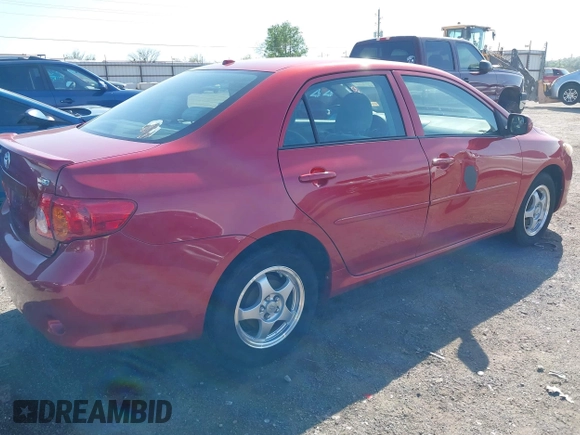2009 Toyota Corolla with VIN 1NXBU40E99Z122454, listed as a IAAI auction lot 41999898 with 202,958 mi miles. Bid and sale history available at carsss.com. Image 4.