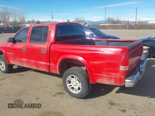 2002 Dodge Dakota SLT z VIN 1B7HG48N32S518455, wystawiony jako IAAI lot #41652316 z przebiegiem 234 856 mil mil oraz . Historia ofert i sprzedaży dostępna na DreamBid. Obrazek 3.