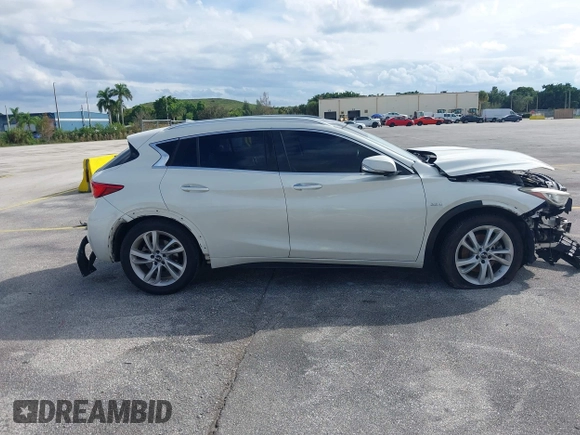 2018 Infiniti QX30 Pure with VIN SJKCH5CPXJA041661, listed as a IAAI auction lot 40614515 with 109,490 mi miles and . Bid and sale history available at DreamBid. Image 14.