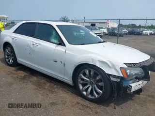 2014 Chrysler 300 S with VIN 2C3CCABG0EH286444, listed as a IAAI auction lot 42482926 with 126,092 mi miles and . Bid and sale history available at DreamBid. Image 1.