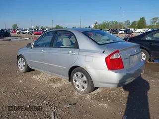 2006 Kia Spectra EX with VIN KNAFE121265312420, listed as a IAAI auction lot 42085732 with 59,641 mi miles. Bid and sale history available at carsss.com. Image 3.