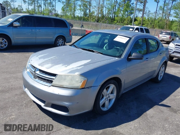 2013 Dodge Avenger with VIN 1C3CDZAB4DN661517, listed as a IAAI auction lot 41886529 with 141,596 mi miles and . Bid and sale history available at DreamBid. Image 2.