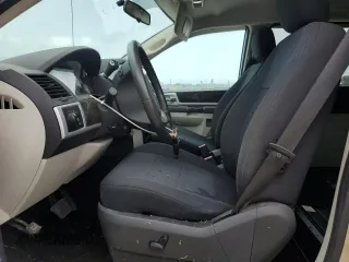 2010 Dodge Grand Caravan with VIN 2D4RN5D12AR197403, listed as a Copart auction lot 54356515 with 105,318 mi miles and Salvage Title. Bid and sale history available at DreamBid. Image 7.