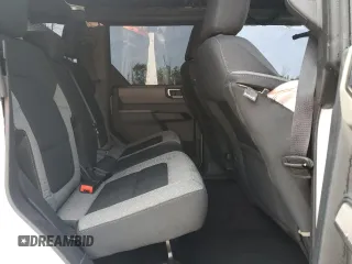 2023 Ford Bronco z VIN 1FMDE5BH2PLB20499, wystawiony jako Copart lot #62211165 z przebiegiem 28 372 mil mil oraz Szkoda całkowita • Salvage title. Historia ofert i sprzedaży dostępna na DreamBid. Obrazek 11.