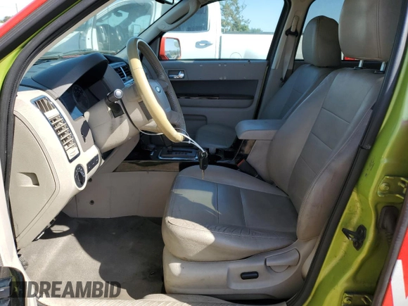 2011 Ford Escape Hybrid with VIN 1FMCU5K31BKA00016, listed as a Copart auction lot 62947255 with 390,317 mi miles and Clean title. Bid and sale history available at DreamBid. Image 7.