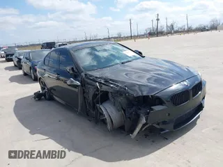 2013 BMW M5 with VIN WBSFV9C54DD095547, listed as a IAAI auction lot 41601733 with 1 mi miles. Bid and sale history available at carsss.com. Image 1.