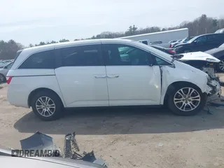 2012 Honda Odyssey EX-L with VIN 5FNRL5H65CB082916, listed as a IAAI auction lot 42052713 with 217,267 mi miles and . Bid and sale history available at carsss.com. Image 14.