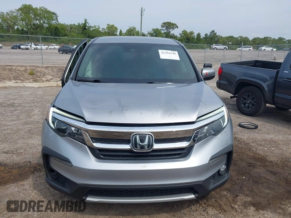 2021 Honda Pilot EX z VIN 5FNYF5H3XMB030112, wystawiony jako IAAI lot #42204148 z przebiegiem 96 182 mil mil oraz . Historia ofert i sprzedaży dostępna na DreamBid. Obrazek 13.