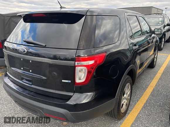 2014 Ford Utility Police Interceptor with VIN 1FM5K8AR3EGC40794, listed as a Copart auction lot 83628614 with 198,516 mi miles and Clean Title. Bid and sale history available at carsss.com. Image 4.